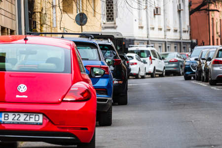 Car traffic at rush hour in downtown area of the city. Car pollution, traffic jam in Bucharest, Romania, 2022のeditorial素材