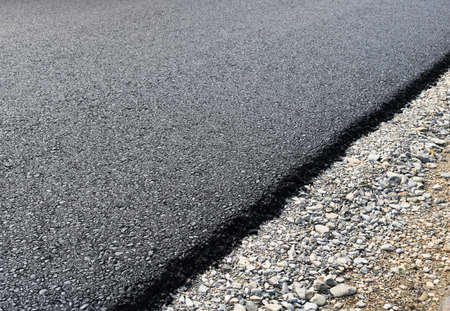 New layer of asphalt road under constructionの写真素材