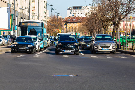 Car traffic at rush hour. Car pollution, traffic jam in Bucharest, Romania, 2022