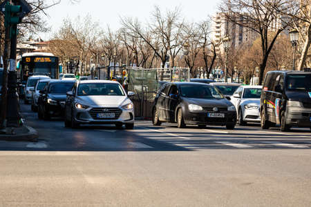 Car traffic at rush hour. Car pollution, traffic jam in Bucharest, Romania, 2022のeditorial素材