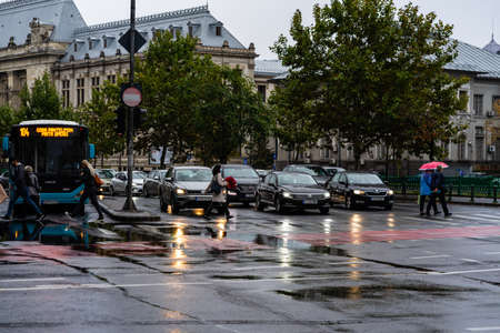 Car traffic at rush hour. Car pollution, traffic jam in Bucharest, Romania, 2022のeditorial素材