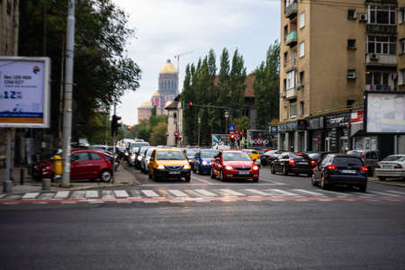 Car traffic at rush hour. Car pollution, traffic jam in Bucharest, Romania, 2022のeditorial素材