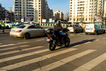 Car traffic, pollution, traffic jam in the morning and evening in the capital city of Bucharest,...