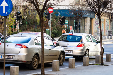 Car traffic, pollution, traffic jam in the morning and evening in the capital city of Bucharest, Romania, 2022のeditorial素材