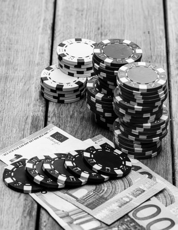 Poker chips, money and gamble