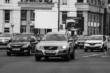 Car traffic, pollution, traffic jam city downtown Bucharest, Romania, 2022
