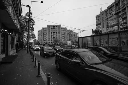 Car traffic, pollution, traffic jam city downtown Bucharest, Romania, 2022のeditorial素材