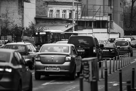 Car traffic, pollution, traffic jam city downtown Bucharest, Romania, 2022のeditorial素材