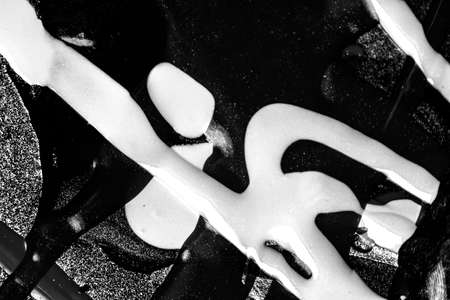 Abstract colorful backdrop with oil drops and waves on water surface. Abstract background conceptの写真素材