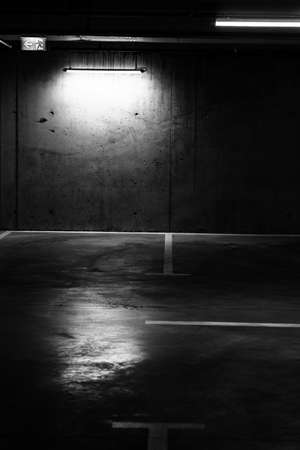 Empty parking lot at underground parking garageの写真素材
