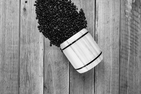 Black coffee cup, coffee beans. Breakfast coffee concept