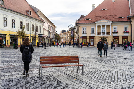 People and tourists wandering in old town Sibiu, Romania, 2022のeditorial素材
