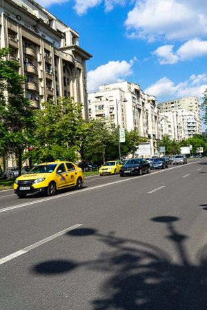 Car traffic, pollution, traffic jam in the morning and evening in the capital city of Bucharest,...