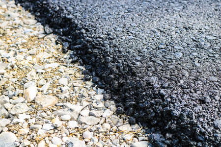 New layer of asphalt road under constructionの写真素材