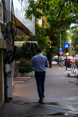 People and tourists wander the streets of the Bucharest Old Town, Romania, 2022のeditorial素材