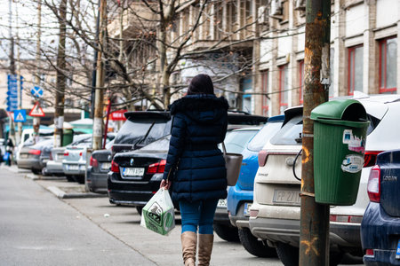 People and tourists wander the streets of the Bucharest Old Town, Romania, 2022のeditorial素材