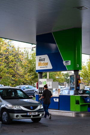 Drivers refuels at OMV gas station in Bucharest, Romania, 2022のeditorial素材