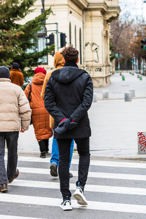 People and tourists wander the streets of the Bucharest Old Town, Romania, 2022のeditorial素材