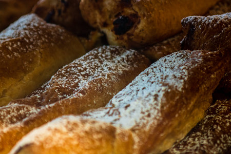 Freshly made pastry in pastry window shop