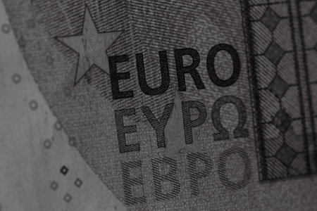 Selective focus on detail of euro banknotes. Close up macro detail of money banknotes, 20 euro isolated. World money concept, inflation and economy conceptの写真素材