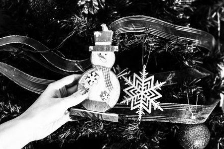 Decorated Christmas ornaments and blurred lightsの写真素材