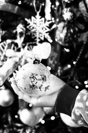 Decorated Christmas ornaments and blurred lightsの写真素材