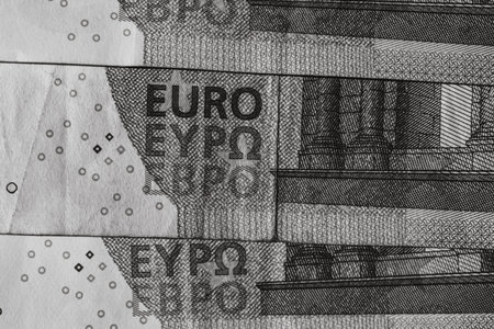 Selective focus on detail of euro banknotes. Close up macro detail of money banknotes, 5 euro...