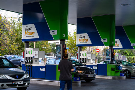 Drivers refuels at OMV gas station in Bucharest, Romania, 2022のeditorial素材