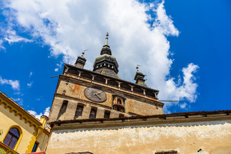 Medieval fortified citadel of Sighisoara city and the famous Clock Towerの写真素材