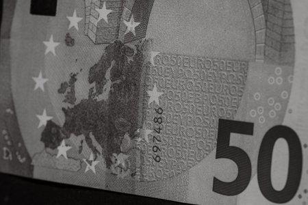 Selective focus on detail of euro banknotes. Close up macro detail of money banknotes, 50 euro...