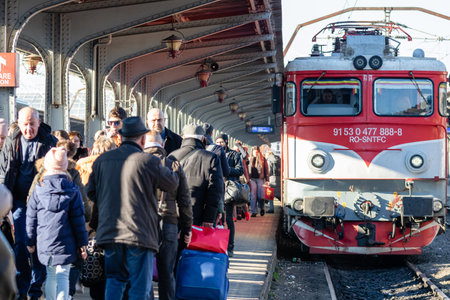 People getting on and off the train at Bucharest North Railway Station (Gara de Nord) in Bucharest, Romania, 2023のeditorial素材