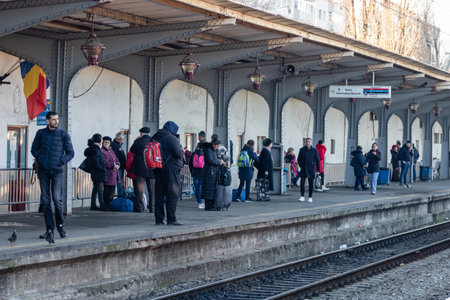 People getting on and off the train at Bucharest North Railway Station (Gara de Nord) in Bucharest, Romania, 2023のeditorial素材
