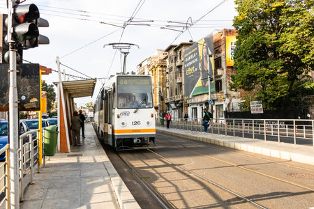 Tram in traffic. Public transport Bucharest, Romania, 2022