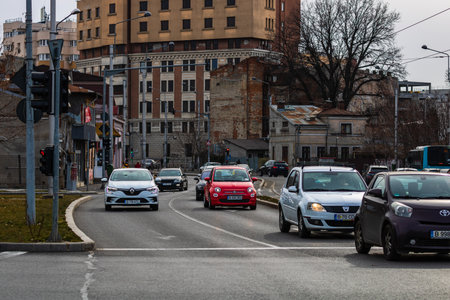 Car traffic at rush hour in downtown area of the city. Car pollution, traffic jam in Bucharest, Romania, 2022のeditorial素材