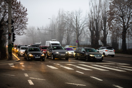 Morning and evening rush hour, stopped cars and heavy traffic on the main boulevard of Bucharest, Romania, 2020のeditorial素材