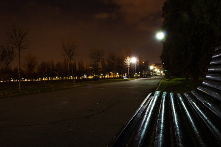 Empty bench at night in the parkの写真素材