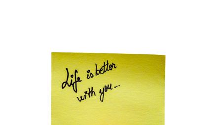 Life is better with you handwriting text close up isolated on yellow paper with copy space.の写真素材