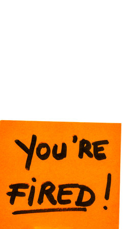You are fired handwriting text close up isolated on orange paper with copy space.の写真素材