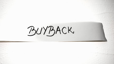 Writing buyback on white label on white background.