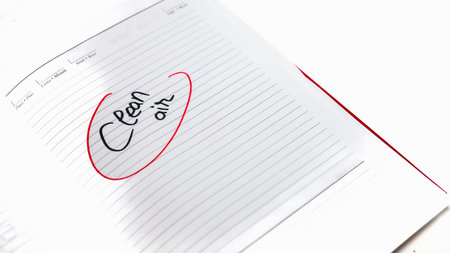 Clean air, handwriting text on page of office agenda. Copy space.