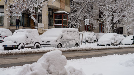 First day of winter, heavy snow in Bucharest city, Romaniaの写真素材