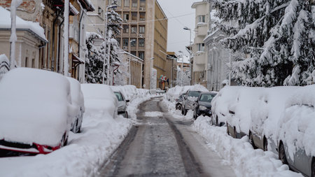 First day of winter, heavy snow in Bucharest city, Romaniaの写真素材