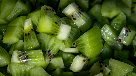 Ripe kiwi fruit. Detail of chopped exotic kiwi fruits used for dessertsの写真素材