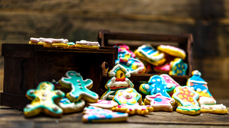Tasty homemade Christmas cookies on wooden tableの写真素材