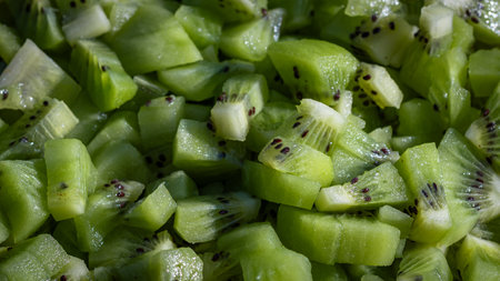 Ripe kiwi fruit. Detail of chopped exotic kiwi fruits used for dessertsの写真素材