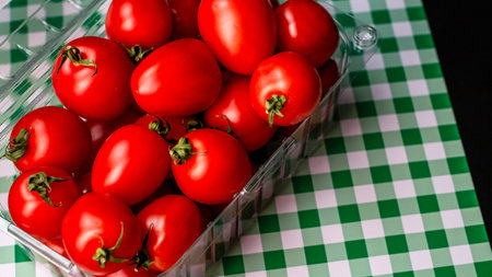 Selective focus on ripe delicious cherry tomatoes, close upの写真素材
