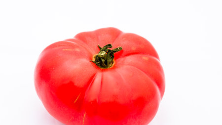 Fresh and tasty ripe red tomatoes isolatedの写真素材