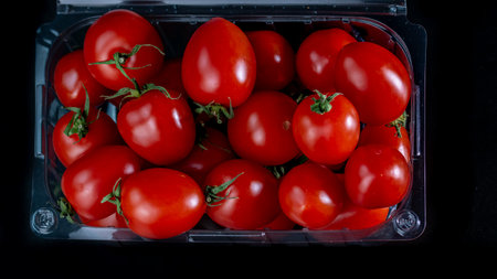 Selective focus on ripe delicious cherry tomatoes, close upの写真素材