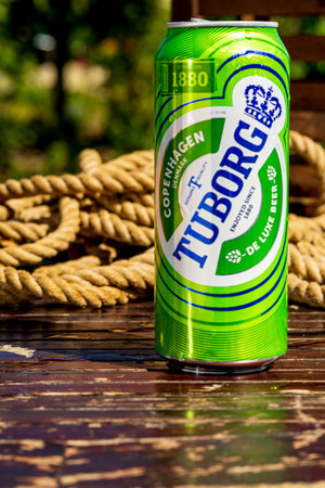 Tuborg beer can - condensation water droplets, outdoors backgroundのeditorial素材