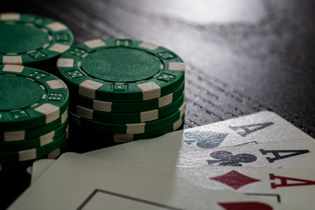 Casino chips and cards on the table. Poker gambling conceptの写真素材